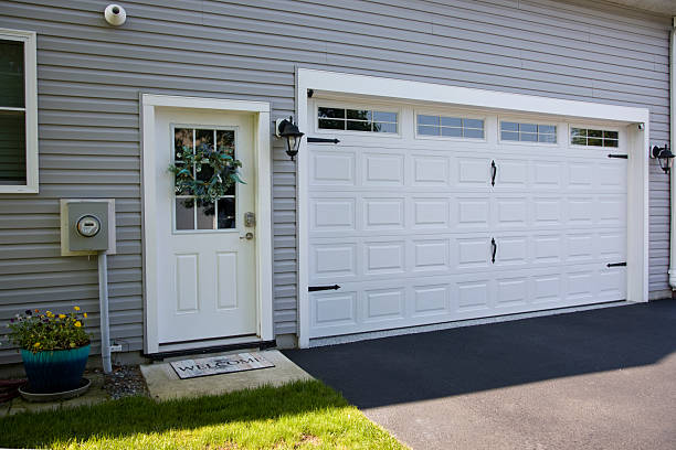 24/7 Emergency Garage Door Panel Replacement experts in Newhall, IA